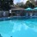pool with lounge chairs and umbrellas 